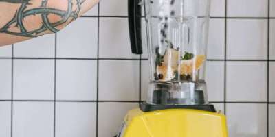 pouring of ingredients on a blender